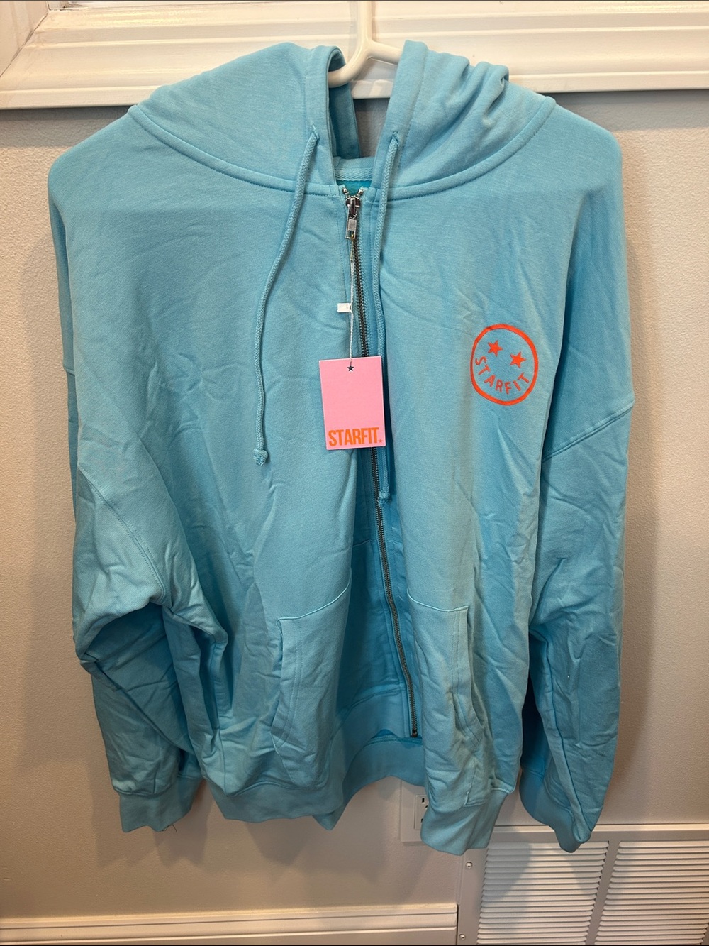 LG/XL Starfit Kids Light Blue Zip Hoodie with Orange Logo